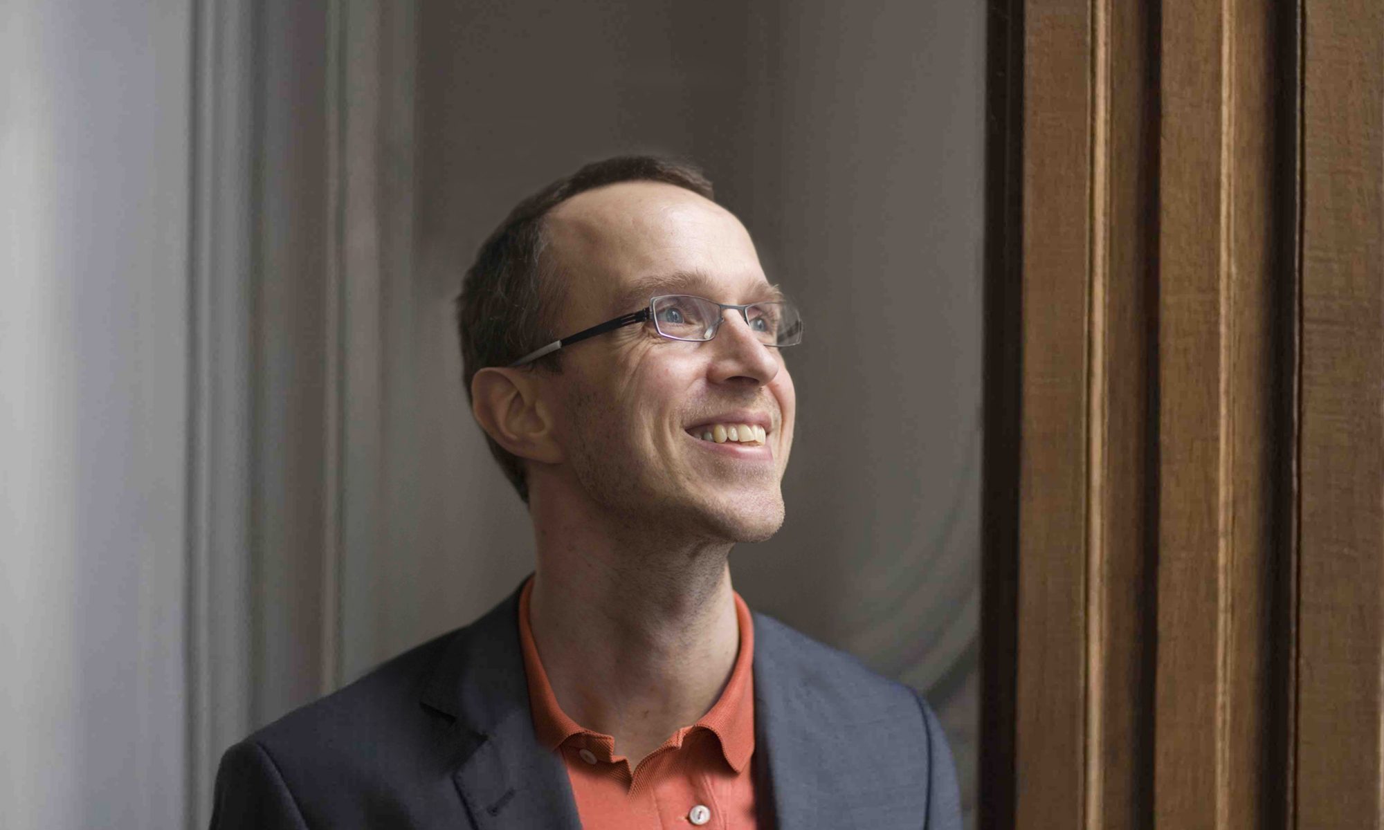 Strong portrait photo with smile for publication